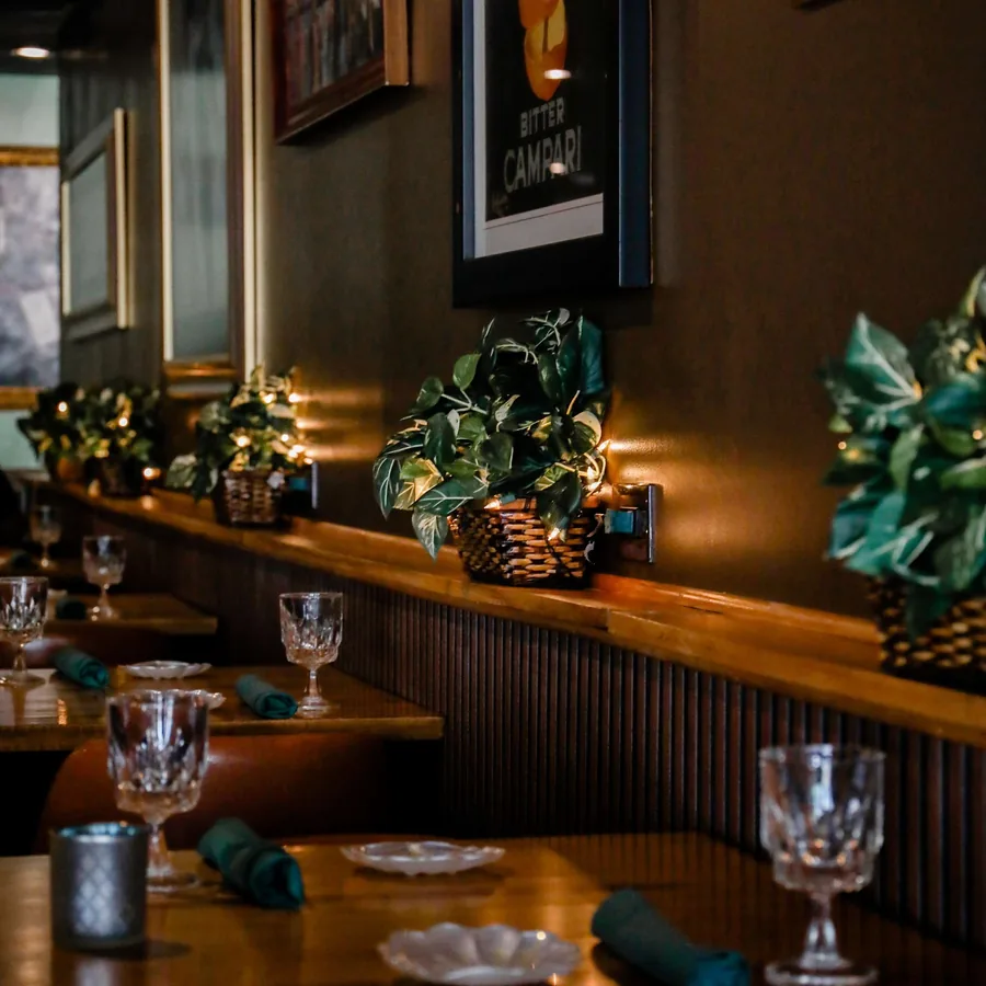 A warmly lit table in the dining room